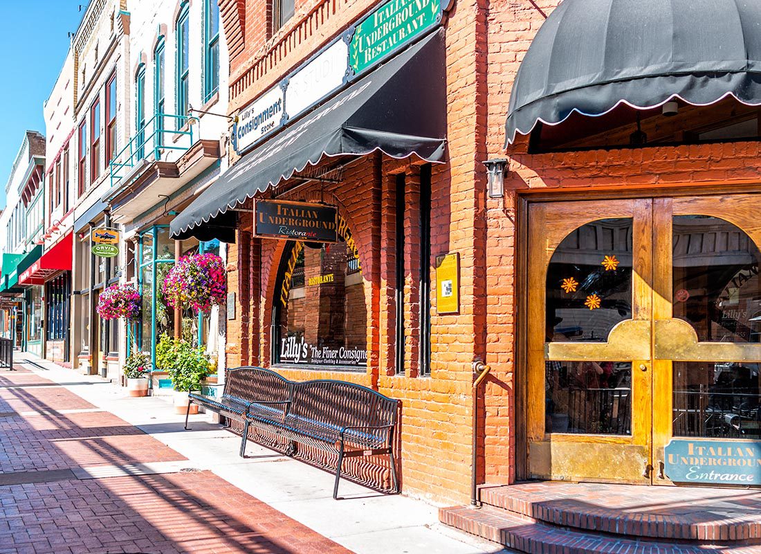 SBA Loan Insurance - Businesses Lined Up on a Main Street in a Small Town on a Beautiful Sunny Day